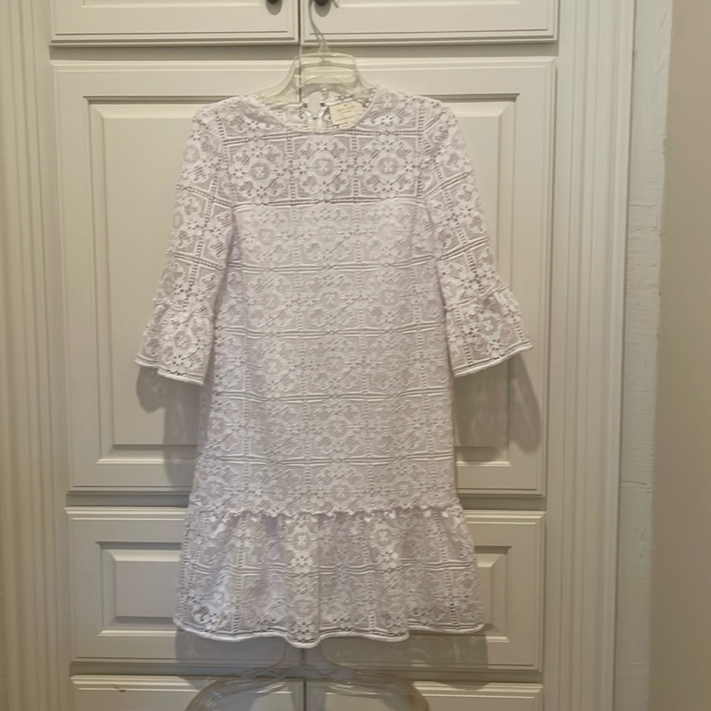 Kate Spade eyelet dress, size 4, 3/4 sleeves, ruffled hem.